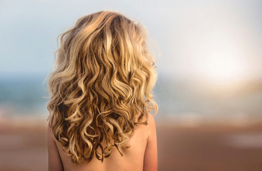 Short blonde curly hair can also be straightened at Make It Straight.